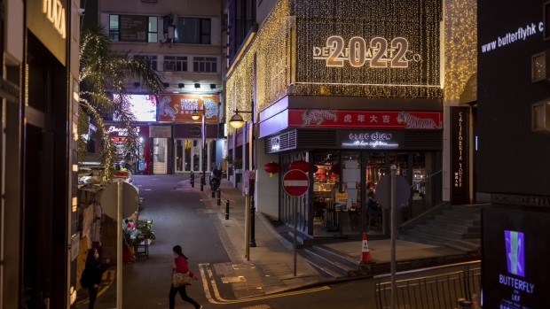 A closed bar in the Lan Kwai Fong nightlife area in Hong Kong, China, on Friday, Jan. 7, 2022. Hong Kong's push to reimpose strict Covid-control measures suffered an embarrassing setback after it emerged that several government officials had gone to a large party attended by a person believed to have Covid.