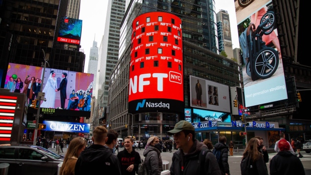 NFT.NYC signage outside the Nasdaq MarketSite during the Annual Non-Fungible Token (NFT) Event in New York, U.S., on Tuesday, Nov. 2, 2021. NFT.NYC brings together over 500 speakers from the crypto, blockchain, and NFT communities for a three-day event of discussions and workshops.
