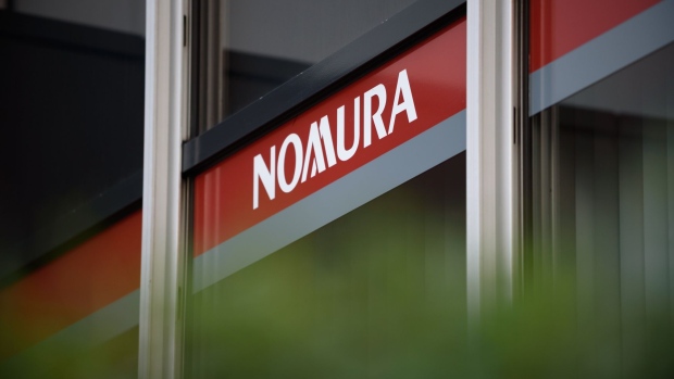 The Nomura Holdings Inc. logo is displayed outside a Nomura Securities Co. branch in Tokyo, Japan, on Tuesday, Jan. 29, 2019. Nomura is scheduled to release earnings figures on Jan. 31. Photographer: Akio Kon/Bloomberg