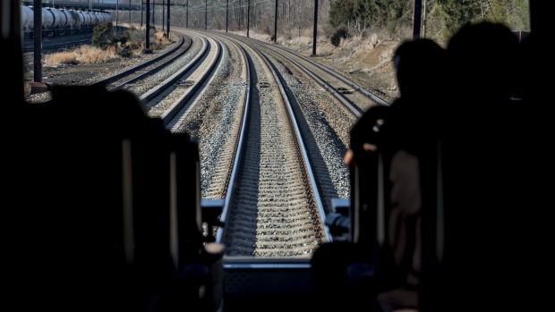 Tracks are seen in front of a train car during a tour of Amtrak's northeast corridor line near Wilmington, Delaware, U.S., on Friday, Jan. 11, 2019. Along Amtrak's Northeast Corridor, roughly $3.4 billion in improvements are underway to bring faster, more reliable service to the busiest rail route in the U.S. Yet the region's biggest and most important infrastructure project remains unfunded, a failure that threatens service to 820,000 regional and commuter passengers each workday. Photographer: Andrew Harrer/Bloomberg