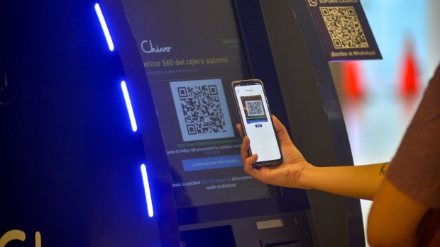 A customer uses a Chivo Bitcoin automated teller machine (ATM) at the Cascadas shopping mall in San Salvador, El Salvador, on Thursday, Sept. 9, 2021. After getting off to a rocky start because of technical glitches to the country's official digital wallet, El Salvadorian businesses have begun accepting Bitcoin payments, including multinationals like Starbucks and Pizza Hut. Photographer: Camilo Freedman/Bloomberg