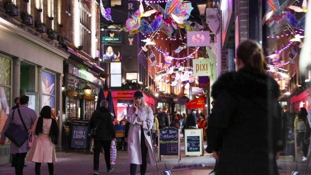 Shoppers walk on Carnaby Street in London, U.K., on Wednesday, Nov. 17, 2021. The U.K. Office for National Statistics are due to release their latest retail figures on Friday.