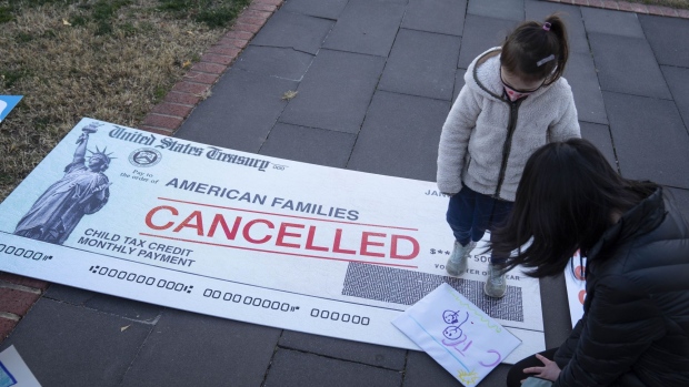Participants in a demonstration organized by the ParentsTogether Foundation in support of the child tax credit in Washington, D.C., on Dec. 13, 2021.