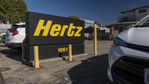 A Hertz car rental lot in Berkeley, California, U.S., on Wednesday, Oct. 27, 2021. Hertz Global Holdings Inc., fresh off a blockbuster order for 100,000 Teslas, reached an exclusive agreement to supply Uber drivers with electric vehicles and signed up Carvana Co. to dispose of rental cars it no longer wants. Photographer: David Paul Morris/Bloomberg