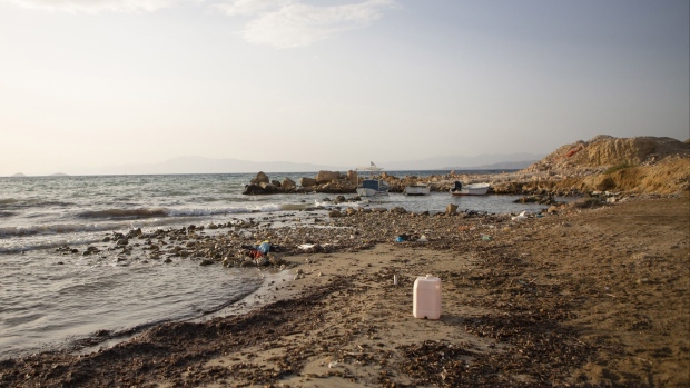 Plastic waste on a beach in Aegina, Greece, on Saturday, Sept. 18, 2021. The Aegean islands are parched, breaking the dependency on imported water will take more than the will of eco-conscious residents. Photographer: Eirini Vourloumis/Bloomberg