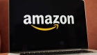 The logo for Amazon.com Inc. is displayed on an Apple Inc. laptop computer in an arranged photograph taken in the Brooklyn borough of New York, U.S., on Friday, April 10, 2020. Across the country, millions of consumers are turning to Amazon.com and other services to fill their fridges via online delivery rather than brave going to a supermarket because of shelter-in-place declarations during the coronavirus pandemic. Photographer: Gabby Jones/Bloomberg