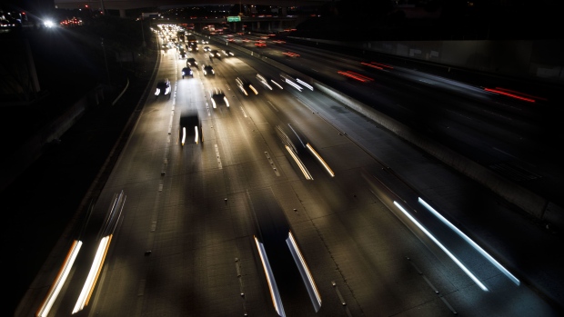 Vehicles drive in traffic down the 405 freeway at night in Inglewood, California, U.S., on Thursday, Sept. 19, 2019. The Trump administration moved to strip California of its authority to limit greenhouse gas emissions from vehicles, even as it warned the state it needs to do more to combat smog. Photographer: Patrick T. Fallon/Bloomberg