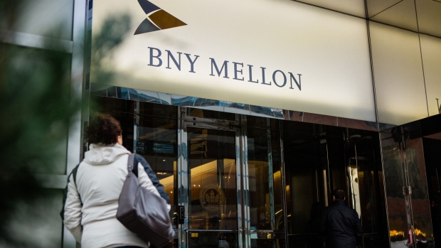 People enter a Bank of New York Mellon Corp. office building in New York, U.S., on Monday, Jan. 13, 2020. BNY Mellon is scheduled to release earnings figures on January 16.