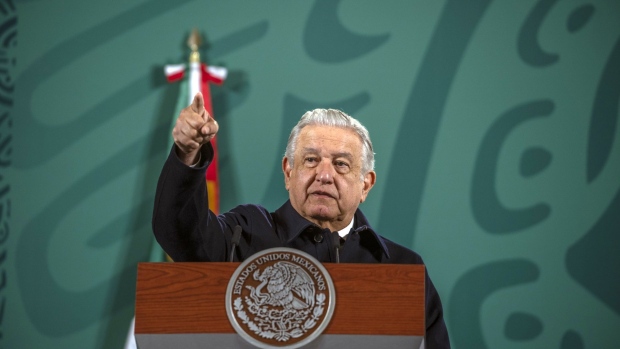Andres Manuel Lopez Obrador, Mexico's president, takes a question during a news conference at the National Palace in Mexico City, Mexico, on Tuesday, Dec. 21, 2021. Mexico is to receive 3.6 million Covid-19 vaccines this week, Deputy Health Minister Hugo Lopez-Gatell said Tuesday.