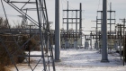 Transmission towers and power lines lead to a substation after a snow storm on February 16, 2021 in Fort Worth, Texas.