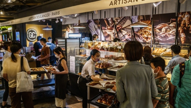 People buy food at a food court inside the K11 Musea shopping mall, developed by K11 Group Ltd., a unit of New world Development Co., in Hong Kong, China, on Friday, April 2, 2021. Hong Kong’s retail sales ended a two-year losing streak in February, surging 30% from a year ago because of last year’s low base when the coronavirus outbreak brought the economy to a halt.
