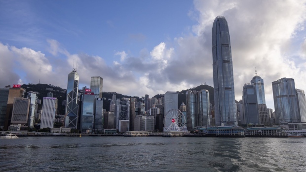 The Two International Financial Center (IFC2) and other buildings in Hong Kong, China, on Wednesday, May, 26, 2021. Hong Kong's unemployment rate fell for a second straight month in April as the city slowly emerges from an extended slump fueled by the pandemic and social unrest. Photographer: Paul Yeung/Bloomberg