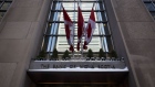 Canadian flags fly outside a Bank of Nova Scotia branch at Scotia Plaza in Toronto, Ontario, Canada, on Monday, Feb. 12, 2018. Bank of Nova Scotia agreed to buy Canadian money manager Jarislowsky Fraser Ltd. for about C$950 million ($755 million), helping push the bank toward its goal of getting more earnings from wealth management.