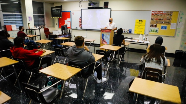 Students inside a classroom during the first day of classes at a public school in Miami Lakes, Florida, U.S., on Monday, Aug. 23, 2021. Courts in Texas and Florida issued preliminary wins to advocates pushing for requirements that students wear masks in school, but the underlying issue is set for further legal review. Photographer: Eva Marie Uzcategui/Bloomberg