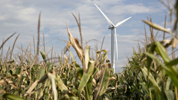 A wind turbine stand on property used by the Alliant Energy Corp. Whispering Willow Wind Farm in Iowa Falls, Iowa, U.S., on Thursday, Sept. 15, 2016. Wind energy, the fastest-growing source of electricity in the U.S., is transforming low-income rural areas in ways not seen since the federal government gave land to homesteaders 150 years ago. Photographer: Daniel Acker/Bloomberg