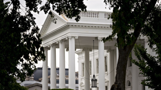 The White House stands in Washington, D.C., U.S., on Wednesday, May 20, 2020. President Donald Trump today said he may reschedule a meeting of the Group of Seven (G-7) nations to take place at Camp David, after having canceled the in-person gathering due to the coronavirus pandemic. Photographer: Andrew Harrer/Bloomberg