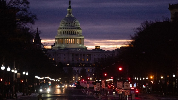 The U.S. Capitol before sunrise in Washington, D.C., U.S., on Tuesday, Jan. 18, 2022. The Senate returns today to take up Democrats' voting rights and election-overhaul legislation, a likely doomed effort amid party disunity over changing longstanding Senate rules.