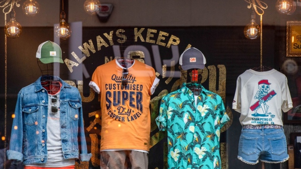 Clothes on display in the window of the Superdry Plc store in Cheltenham, U.K., on Monday, July 5, 2021. Superdry will be making their next earnings announcement on July 8.
