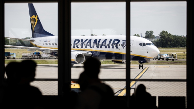 A Ryanair Holdings Plc passenger aircraft taxis towards a gate at Budapest Ferenc Liszt International Airport in Budapest, Hungary, on Wednesday, Aug. 4, 2021. The Hungarian government has made a non-binding offer to buy Budapest Airport, according to people familiar with the matter, as Prime Minister Viktor Orban seeks to gain control of what had been one of the fastest growing hubs in the region before the coronavirus pandemic.