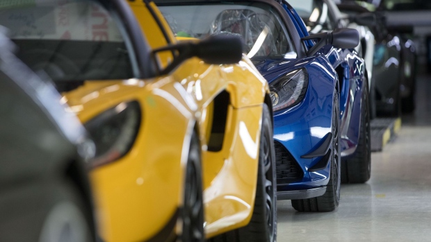 Finished Lotus sports cars sit on the inspection line at the Group Lotus Plc, a luxury unit of Proton Holdings Bhd., automobile factory in Hethel, U.K.