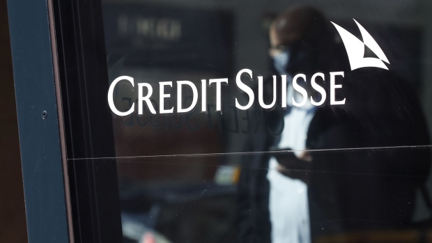A Credit Suisse logo in the window of a Credit Suisse Group AG bank branch in Zurich, Switzerland, on Thursday, April 8, 2021. Credit Suisse Chief Executive Officer Thomas Gottstein gathered dozens of managing directors at the global bank on a conference call late Tuesday, as part of crisis-management efforts after the lender announced that it stands to lose as much as $4.7 billion amid the meltdown of hedge fund Archegos Capital Management.