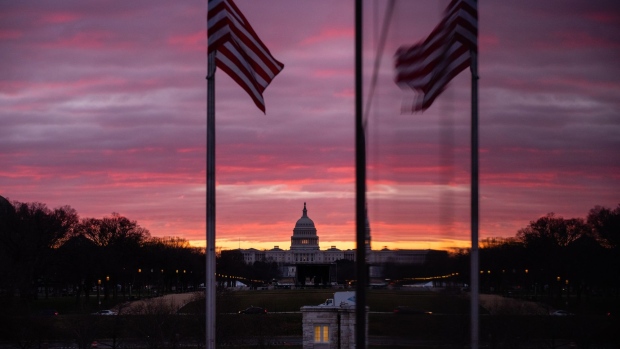 The U.S. Capitol at sunrise in Washington, D.C., U.S., on Tuesday, Jan. 18, 2022. The Senate returns today to take up Democrats' voting rights and election-overhaul legislation, a likely doomed effort amid party disunity over changing longstanding Senate rules.