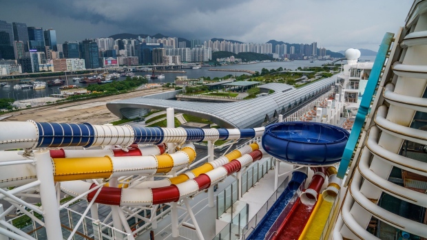 The Genting Dream cruise ship operated by Genting Hong Kong Ltd., a unit of Genting Bhd., sits berthed at the Marina Bay Cruise Center in Singapore, on Friday, Dec. 14, 2018. Chinese desire for more leisure travel is stoking a boom in Asia's market for cruises, according to Genting Bhd. Chairman Lim Kok Thay.