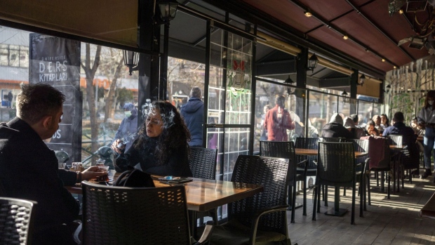 Customers inside a coffee shop in Eskisehir, Turkey, on Tuesday, Jan. 18, 2022. Turkey is set to pause its cycle of interest-rate cuts after a sliding currency and rising global energy prices pushed consumer inflation to its highest level since the beginning of President Recep Tayyip Erdogan’s rule.