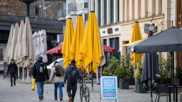 An empty restaurant terrace in central Berlin, Germany, on Friday, Jan. 7, 2022. Germany tightened restrictions on access to restaurants and cafes and vowed to accelerate vaccinations in an effort to keep the rapidly spreading omicron strain of the coronavirus in check.