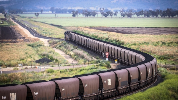 A freight train transports coal from the Gunnedah Coal Handling and Prepararation Plant, operated by Whitehaven Coal Ltd., in Gunnedah, New South Wales, Australia, on Tuesday, Oct. 13, 2020. Prime Minister Scott Morrison warned last month that if power generators don't commit to building 1,000 megawatts of gas-fired generation capacity by April to replace a coal plant set to close in 2023, the pro fossil-fuel government would do so itself.