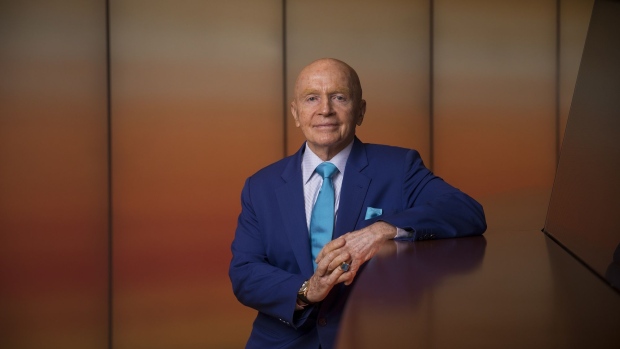 Mark Mobius, co-founder of Mobius Capital Partners, poses for a photograph following a Bloomberg Television interview in London, U.K., on Wednesday, May 15, 2019. The emerging-market benchmark index will probably keep falling if the trade war persists, given China's significant weighting, Mobius said during the interview.