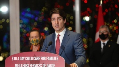 Justin Trudeau, Canada's prime minister, speaks during a news conference in Ottawa, Ontario, Canada, on Wednesday, Dec. 15, 2021. Trudeau’s government is asking Canadians to avoid non-essential trips to other countries over the next month as the spread of the omicron Covid-19 variant accelerates.