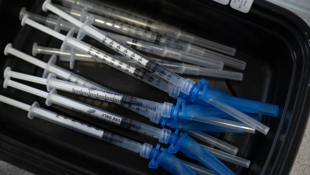 Covid-19 vaccine syringes at a Southern Nevada Health District testing site in Las Vegas, Nevada, U.S., on Thursday, Jan. 6, 2022. Nevada reached a half-million positive Covid-19 tests in data released yesterday, but the true picture is probably bigger as testing efforts expand with the emergence of the omicron variant. Photographer: Bridget Bennett/Bloomberg