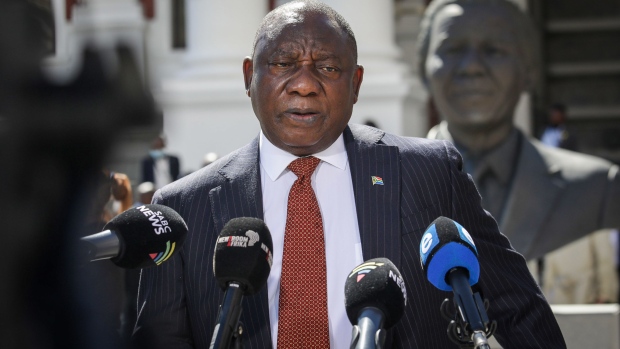 Cyril Ramaphosa, South Africa's president, speaks to the media outside parliament in Cape Town, South Africa, on Thursday, Nov. 11, 2021. South Africa’s Treasury vowed to return state finances to a sustainable path, holding off expanding welfare measures in one of the world’s most unequal societies. Government bonds and the rand gained.