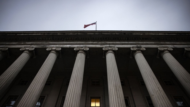 The U.S. Treasury building in Washington, D.C., U.S., on Sunday, Dec. 19, 2021. The Treasury's top official for financial oversight said government regulators need action from lawmakers to adequately protect investors, and the wider financial system, from risks posed by stablecoins. Photographer: Samuel Corum/Bloomberg