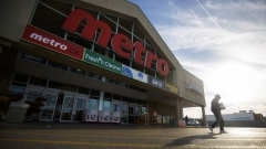 A customer exits a Metro Inc. grocery store in Toronto, Ontario, Canada, on Monday, Oct. 2, 2017. Canadian grocer Metro Inc. agreed to buy pharmacy chain Jean Coutu Group Inc. for C$4.5 billion ($3.6 billion) to diversify its business in an industry under increasing threat from Amazon.com Inc.'s food expansion. Photographer: Cole Burston/Bloomberg