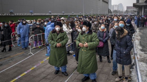 Members of the public wait in line to be tested for Covid-19 in Beijing, on Jan. 24.