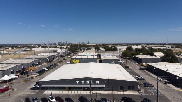 The new Tesla South Austin showroom within the Yard development in Austin, Texas, U.S., on Saturday, Oct. 16, 2021. From a sprawling factory outside Austin to a property-buying binge on the Gulf Coast, Elon Musk is making an imprint in a state that has long welcomed eccentric outsiders.