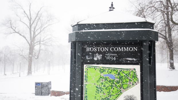 A map is seen at the Boston Common during a snow storm in Boston, Massachusetts, U.S., on Thursday, Jan. 4, 2018. A fast-moving winter storm, growing stronger by the hour, has grounded 3,000 flights, delayed rail travelers in the busy Northeast Corridor and closed schools in New York and Boston.
