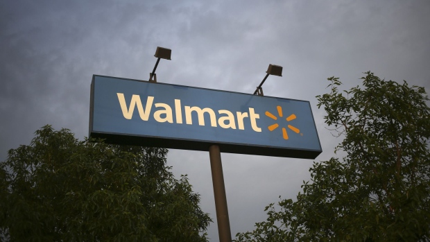 Wal-Mart Stores Inc. signage is displayed outside of a store in Louisville, Kentucky, U.S., on Friday, May 15, 2015. Photographer: Luke Sharrett