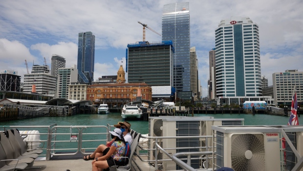 Buildings in the central business district in Auckland, New Zealand, on Sunday, Dec. 5, 2021. New Zealand’s largest city has exited lockdown, bringing relief to its residents but also signaling the likely spread of Covid-19 to the rest of the country. Photographer: Brendon O'Hagan/Bloomberg