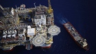 The Kobe Chouest platform supply vessel sits anchored next to the Chevron Corp. Jack/St. Malo deepwater oil platform in the Gulf of Mexico in the aerial photograph taken off the coast of Louisiana, U.S.
