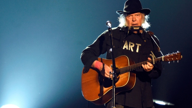 LOS ANGELES, CA - FEBRUARY 06: Singer Neil Young performs onstage at the 25th anniversary MusiCares 2015 Person Of The Year Gala honoring Bob Dylan at the Los Angeles Convention Center on February 6, 2015 in Los Angeles, California. The annual benefit raises critical funds for MusiCares' Emergency Financial Assistance and Addiction Recovery programs. (Photo by Frazer Harrison/Getty Images)