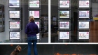 A pedestrian looks at residential sales displayed in the window of an estate agent in Loughborough, U.K., on Monday, July 5, 2021. Global valuations in the property markets are soaring at the fastest pace since 2006, according to Knight Frank, with annual price increases in double digits. Photographer: Darren Staples/Bloomberg