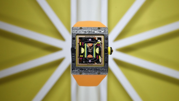 An RM 16-01 Automatic Citron watch from the 'Bonbon' collection stands on display on the Richard Mille stand during the Salon International de la Haute Horlogerie (SIHH) in Geneva, Switzerland, on Tuesday, Jan. 15, 2019. The elephant in the room at this week’s Swiss watch fair in Geneva is that the industry is still struggling to find buyers for all the timepieces it has produced over the years.