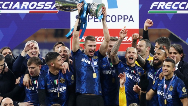 Inter Milan players celebrate the Supercup win in Milan, Italy on Jan 12.