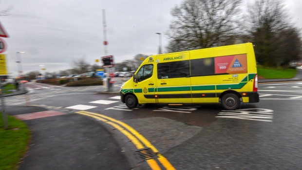An ambulance drives towards the Emergency Department at Royal Preston Hospital in Preston, U.K., on Monday, Jan. 10, 2022. The U.K.'s National Health Service is setting up so-called Nightingale care hubs to prepare for a potential surge in Covid-19 admissions due to the omicron variant. Photographer: Anthony Devlin/Bloomberg