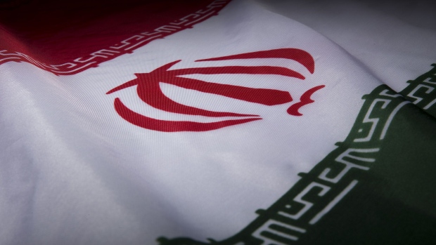 The Iranian flag is arranged for a photograph in New York, U.S., on Friday, Feb. 21, 2014. Iran and six world powers yesterday agreed in Vienna on a framework for negotiating a comprehensive nuclear agreement, following up on November's interim accord. Photographer: Bloomberg/Bloomberg