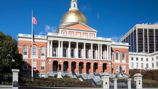 BOSTON, MASSACHUSETTS: Massachusetts State House the seat of Government, with golden dome and patriotic Stars and Strips flag in the city of Boston, United States. (Photo by Tim Graham/Getty Images)