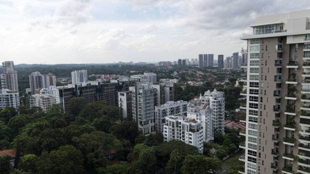 A view of condominiums from an apartment for sale at the Reignwood Hamilton Scotts luxury apartment building on Scotts Road in Singapore, on Thursday, Aug. 5, 2021. The apartment listed on the market with Singapore Realtors Inc. is in a neighborhood that's walking distance from the famous Orchard Road shopping district in Singapore, where home prices jumped by a record 4.1% in the first half as tycoons across Asia seek a safe harbor. Photographer: Wei Leng Tay/Bloomberg
